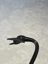 A Chinese bronze candle or incense holder in the shape of a crane standing on a turtle and a Tibetan vajra, Ming/Qing