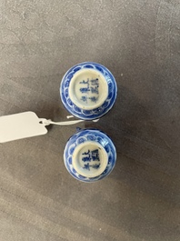 A pair of Chinese blue and white miniature 'hu' vases on wooden stands, Kangxi mark, 19th C.