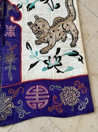 A Chinese gilt-metal embroidered silk 'animals' children's robe, 19/20th C.