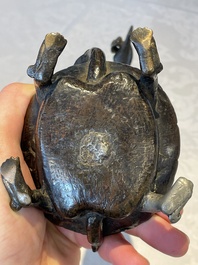 A Chinese bronze candle or incense holder in the shape of a crane standing on a turtle and a Tibetan vajra, Ming/Qing