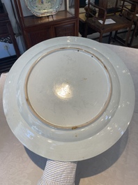 A Chinese famille rose dish and four plates with floral design, Qianlong