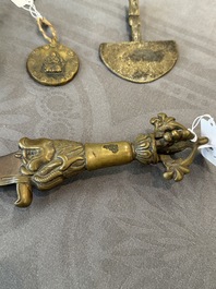 A varied collection of Tibetan bronze, iron and copper alloy ritual instruments, 14th C. and later