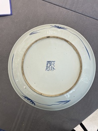 A pair of Chinese blue and white 'peony' dishes, Chenghua mark, 19th C.