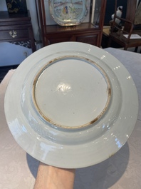 A Chinese famille rose dish and four plates with floral design, Qianlong