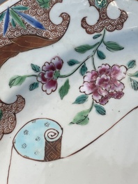 A Chinese famille rose dish and four plates with floral design, Qianlong