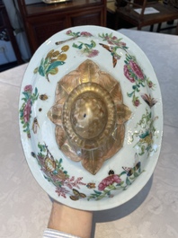A Chinese Canton famille rose covered tureen on stand with flowers, fruits and insects, 19th C.