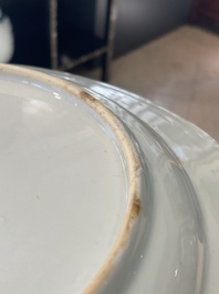 A Chinese famille rose dish and four plates with floral design, Qianlong