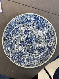 A pair of Chinese blue and white 'peony' dishes, Chenghua mark, 19th C.