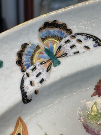 A Chinese Canton famille rose covered tureen on stand with flowers, fruits and insects, 19th C.