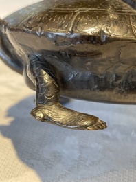 A Chinese bronze candle or incense holder in the shape of a crane standing on a turtle and a Tibetan vajra, Ming/Qing
