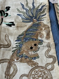 A Chinese gilt-metal embroidered silk 'animals' children's robe, 19/20th C.