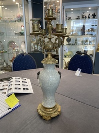 A pair of Chinese blue and white Nanking crackle-glazed vases with gilt bronze candelabra mounts, 19th C.