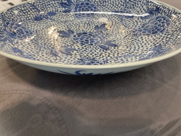 A pair of Chinese blue and white 'peony' dishes, Chenghua mark, 19th C.