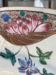 A Chinese famille rose dish and four plates with floral design, Qianlong