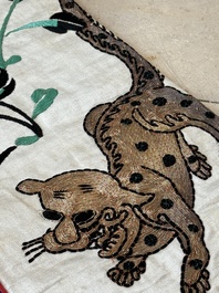A Chinese gilt-metal embroidered silk 'animals' children's robe, 19/20th C.