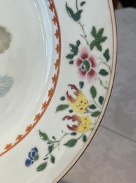 A Chinese famille rose dish and four plates with floral design, Qianlong