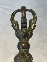 A Chinese bronze candle or incense holder in the shape of a crane standing on a turtle and a Tibetan vajra, Ming/Qing