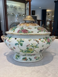 A Chinese Canton famille rose covered tureen on stand with flowers, fruits and insects, 19th C.