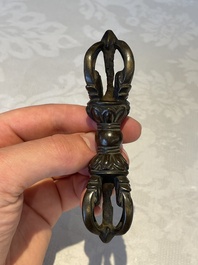 A Chinese bronze candle or incense holder in the shape of a crane standing on a turtle and a Tibetan vajra, Ming/Qing