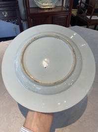 A Chinese famille rose dish and four plates with floral design, Qianlong