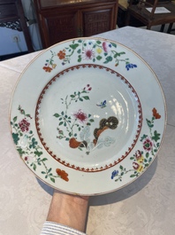 A Chinese famille rose dish and four plates with floral design, Qianlong