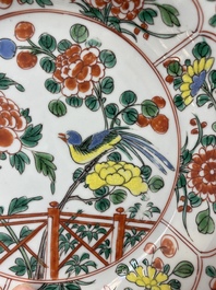 A pair of Chinese famille verte 'bird and peonies' plates, Kangxi