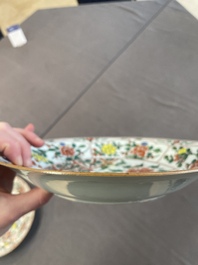 A pair of Chinese famille verte 'bird and peonies' plates, Kangxi
