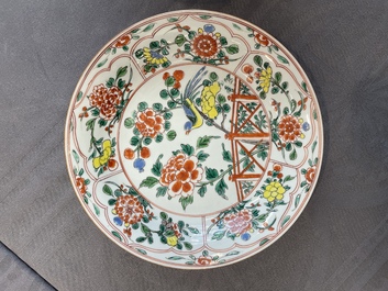 A pair of Chinese famille verte 'bird and peonies' plates, Kangxi