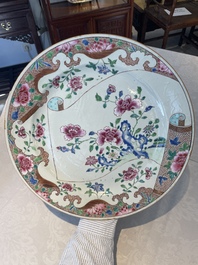 A Chinese famille rose dish and four plates with floral design, Qianlong