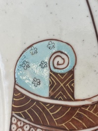 A Chinese famille rose dish and four plates with floral design, Qianlong