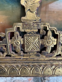 A rare Chinese gilt wood and reverse glass painted mirror, 2nd half 18th C.
