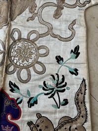 A Chinese gilt-metal embroidered silk 'animals' children's robe, 19/20th C.