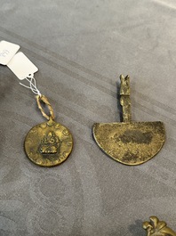 A varied collection of Tibetan bronze, iron and copper alloy ritual instruments, 14th C. and later