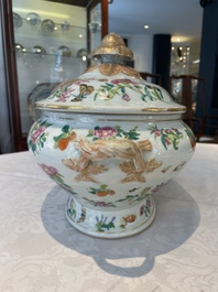 A Chinese Canton famille rose covered tureen on stand with flowers, fruits and insects, 19th C.