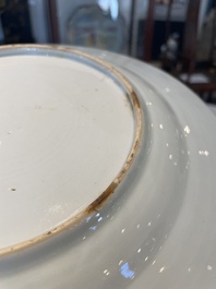 A Chinese famille rose dish and four plates with floral design, Qianlong