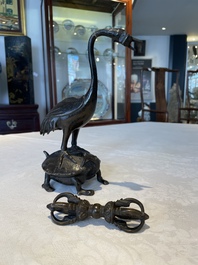 A Chinese bronze candle or incense holder in the shape of a crane standing on a turtle and a Tibetan vajra, Ming/Qing