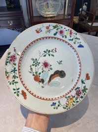 A Chinese famille rose dish and four plates with floral design, Qianlong