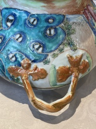 A Chinese Canton famille rose tureen and cover with narrative design, 19th C.