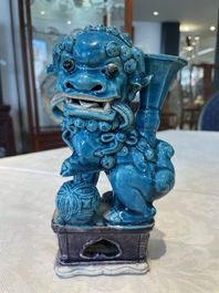 Three Chinese turquoise-glazed vases and a turquoise and aubergine-glazed Buddhist lion, Kangxi