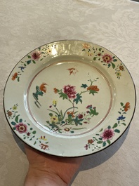 A Chinese famille rose dish, two plates and a Dutch-decorated plate, Qianlong