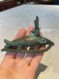 A varied collection of five bronze figures and utensils, Egypt, 3rd/1st C. B.C.