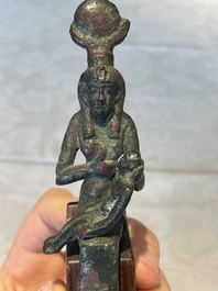 A varied collection of five bronze figures and utensils, Egypt, 3rd/1st C. B.C.