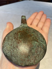 A varied collection of five bronze figures and utensils, Egypt, 3rd/1st C. B.C.