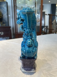 Three Chinese turquoise-glazed vases and a turquoise and aubergine-glazed Buddhist lion, Kangxi