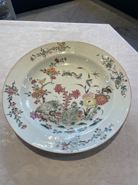 A Chinese famille rose dish, two plates and a Dutch-decorated plate, Qianlong
