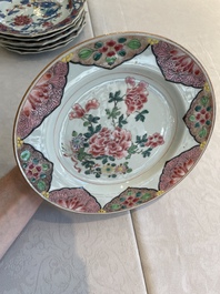 Two sets of six Chinese famille rose plates with peonies, Yongzheng/Qianlong