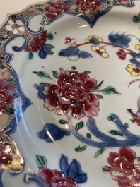 Two sets of six Chinese famille rose plates with peonies, Yongzheng/Qianlong