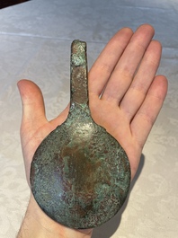 A varied collection of five bronze figures and utensils, Egypt, 3rd/1st C. B.C.