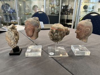 A varied collection of eight pottery, stone and stucco fragments, Asia, 2nd C. B.C. and later