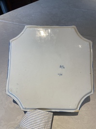 A blue and white Dutch Delft chinoiserie plaque with a tea drinking scene, 18th C.